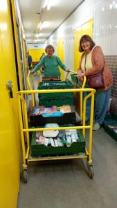 Volunteers with harvest donations